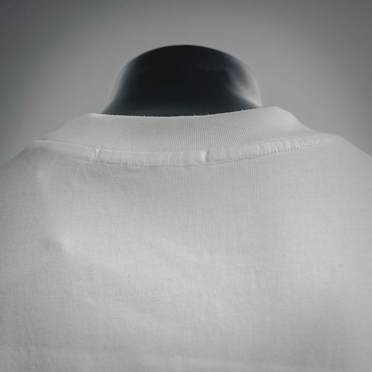 White T-shirt crew neck collar close-up