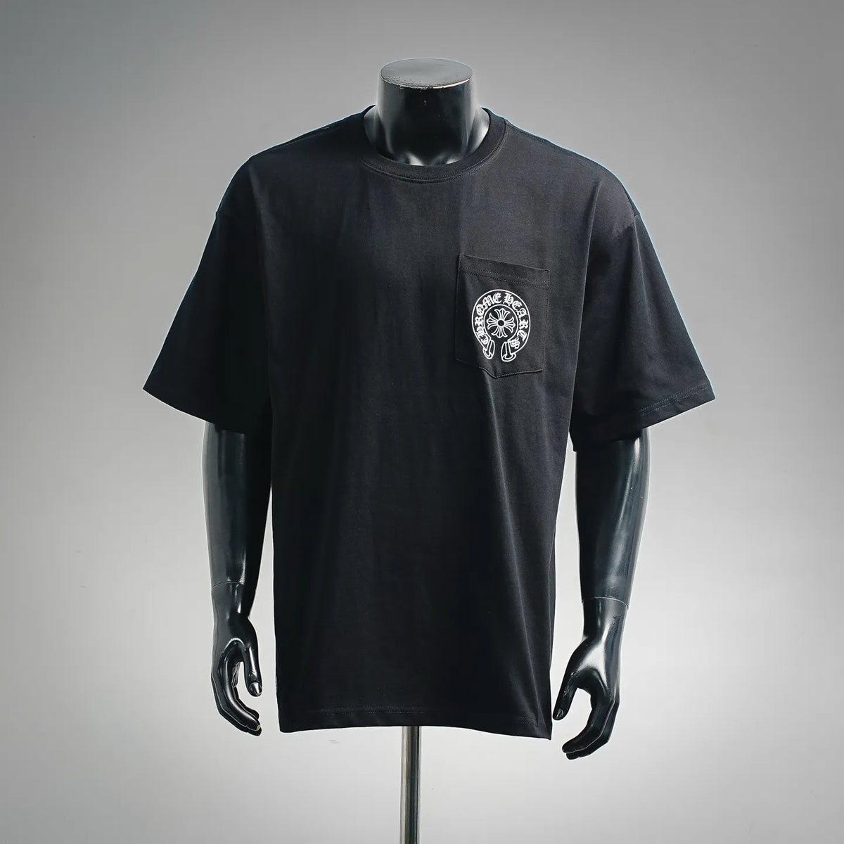 Men's black short-sleeve crewneck T-shirt with front chest emblem graphic