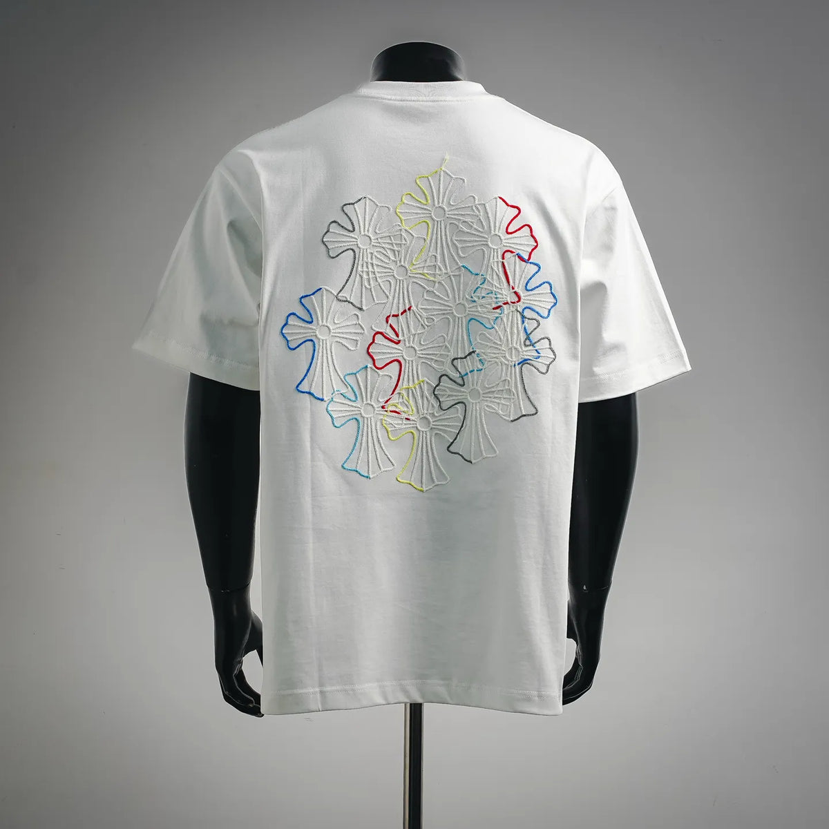 White crew-neck T-shirt with large multicolor embroidered graphic on the back