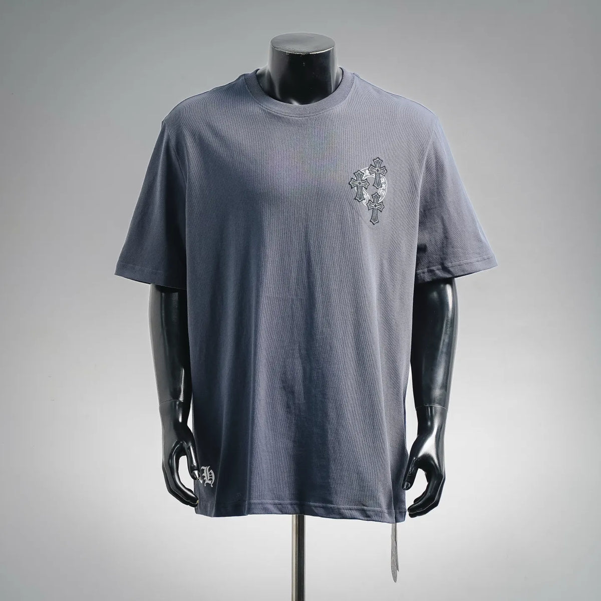 Blue crewneck short-sleeve t-shirt with small front cross graphic