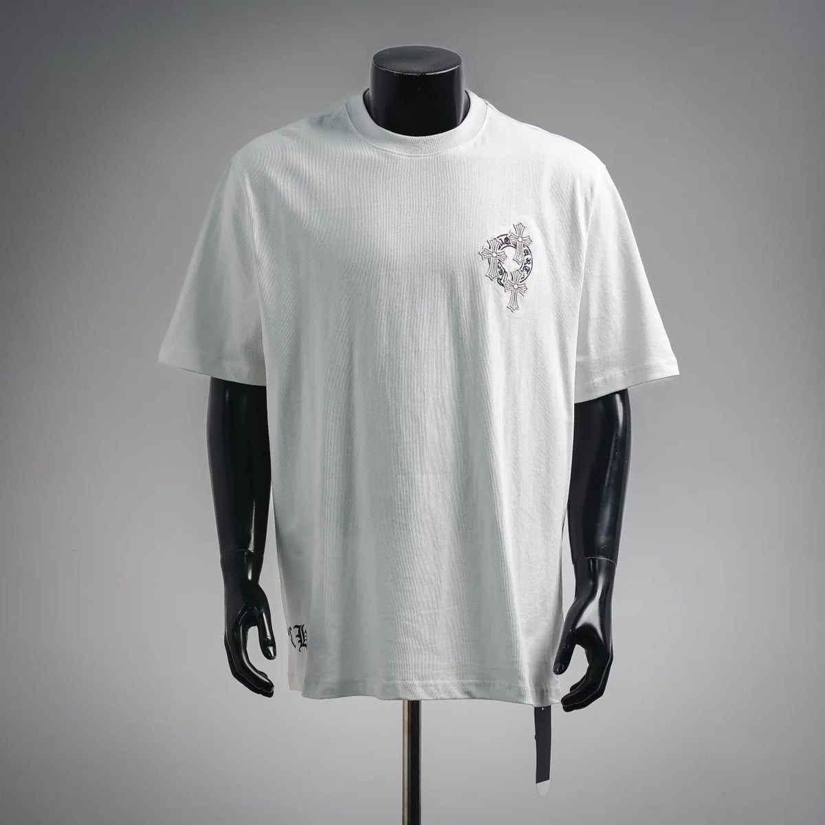 White short-sleeve crewneck T-shirt with small front chest graphic embroidery