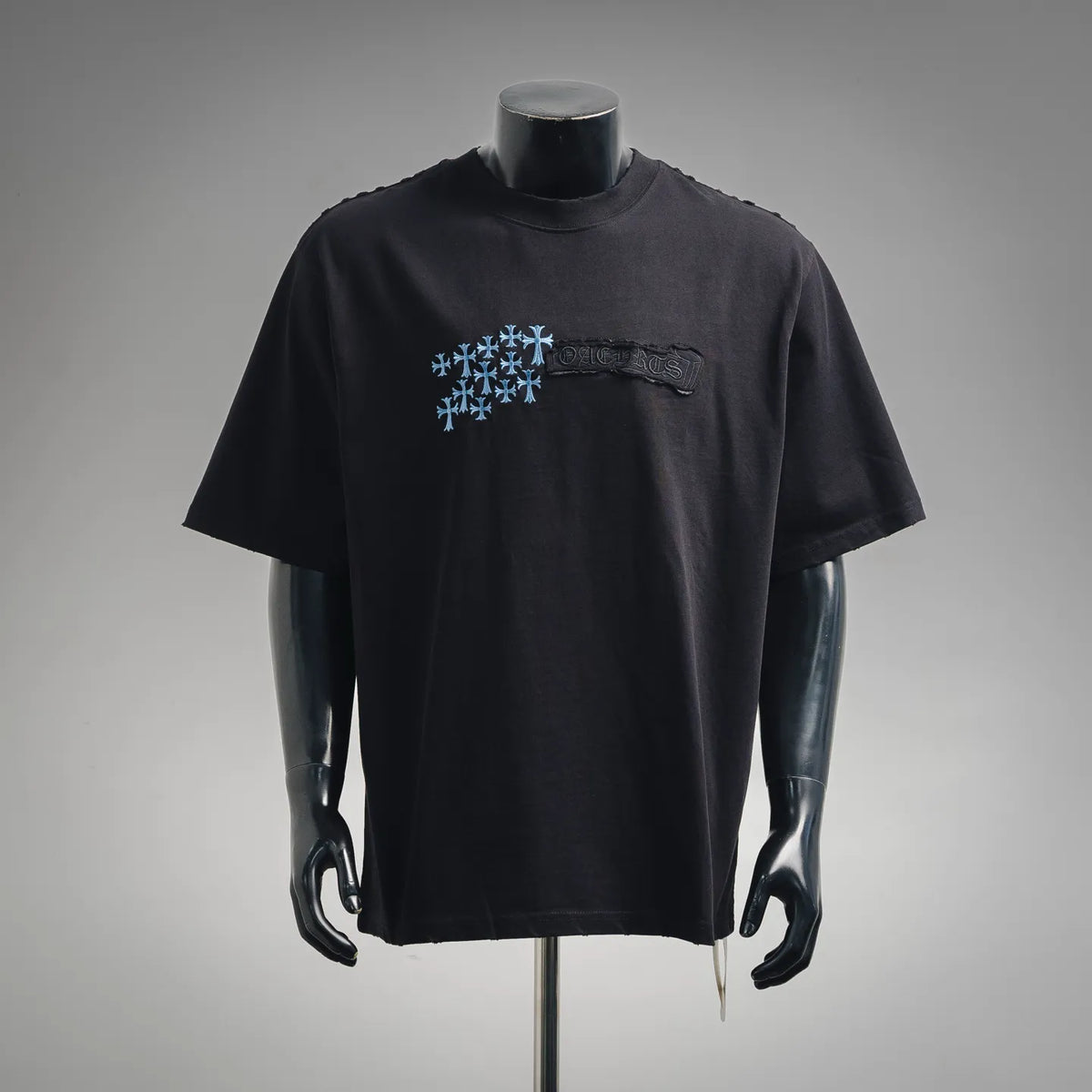 Black short-sleeve T-shirt with blue snowflake graphic and small chest emblem