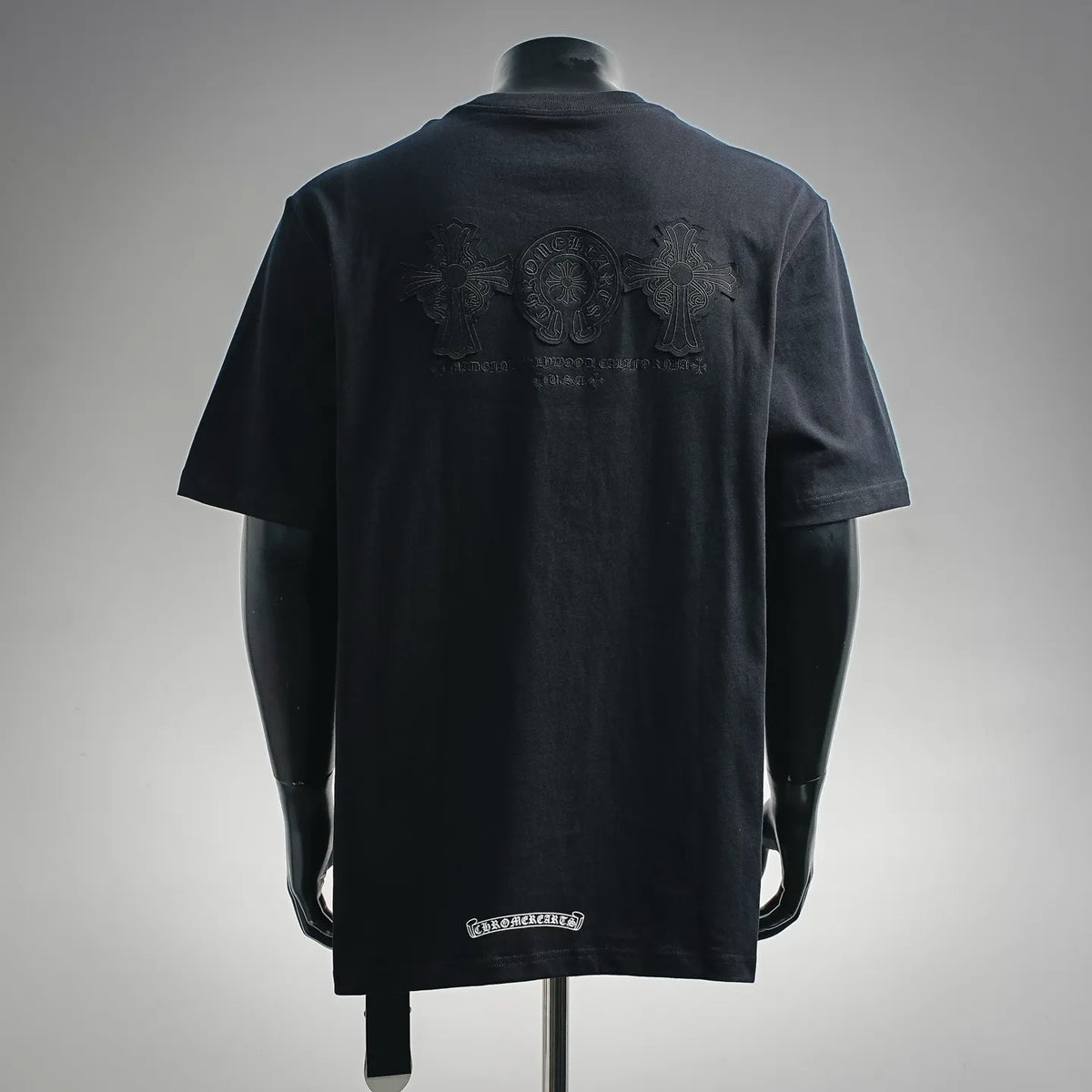 Black short-sleeve T-shirt with back graphic and small lower hem logo