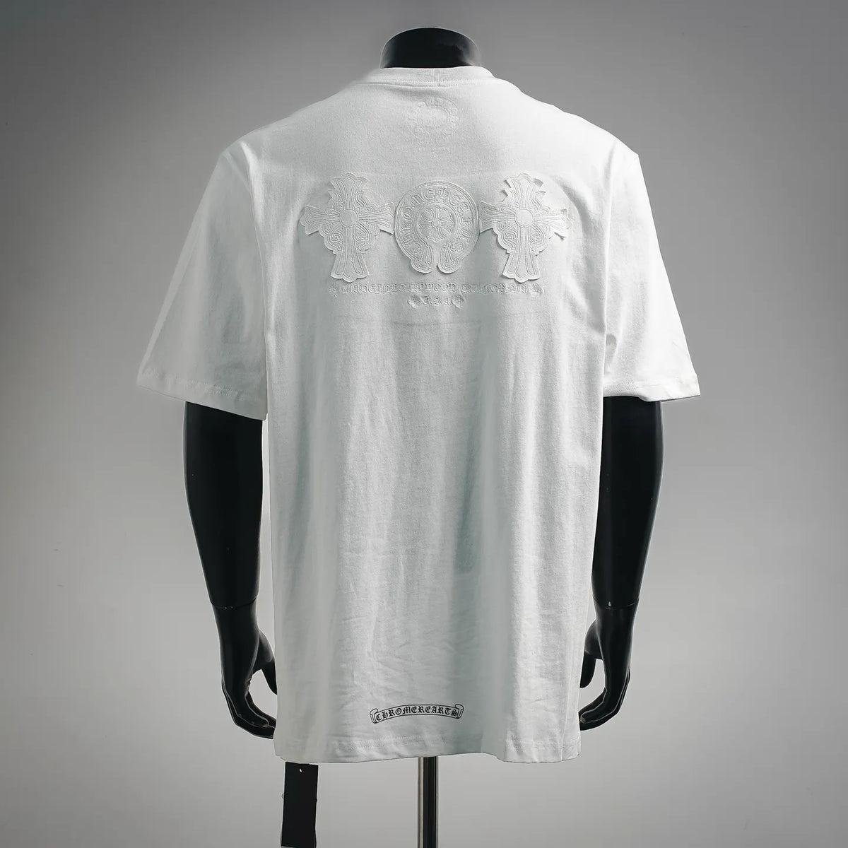 White short-sleeve crewneck T-shirt with large raised back logo emblem