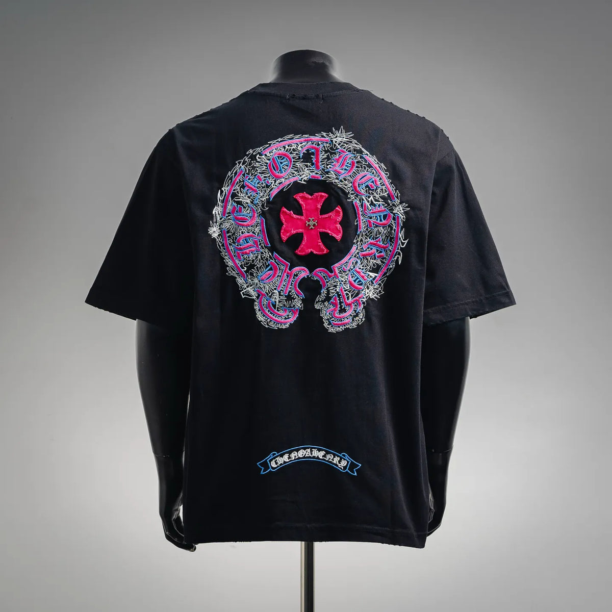 Black short-sleeve T-shirt with large back skull-style graphic and small lower logo