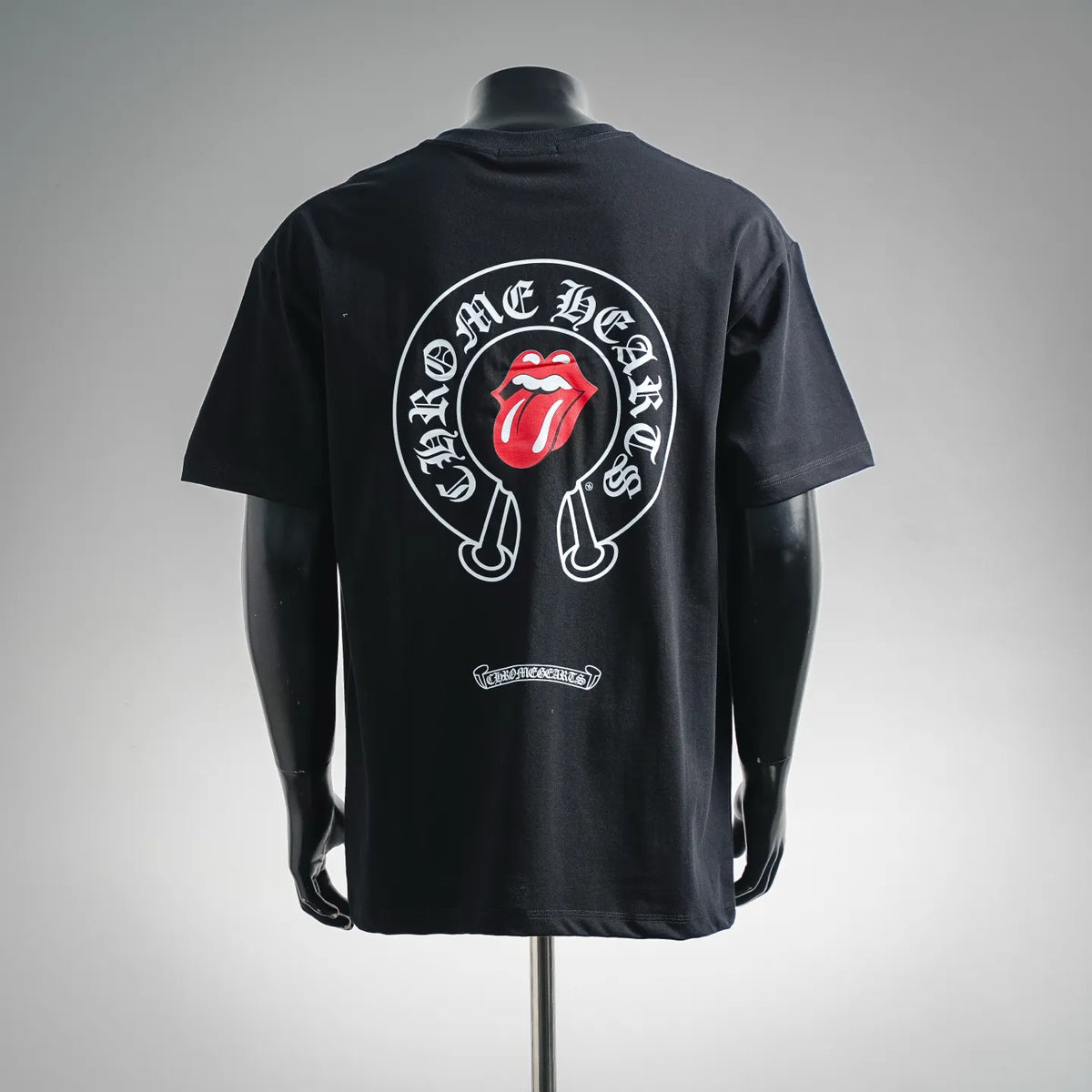 Black short-sleeve T-shirt with large circular lips graphic on the back