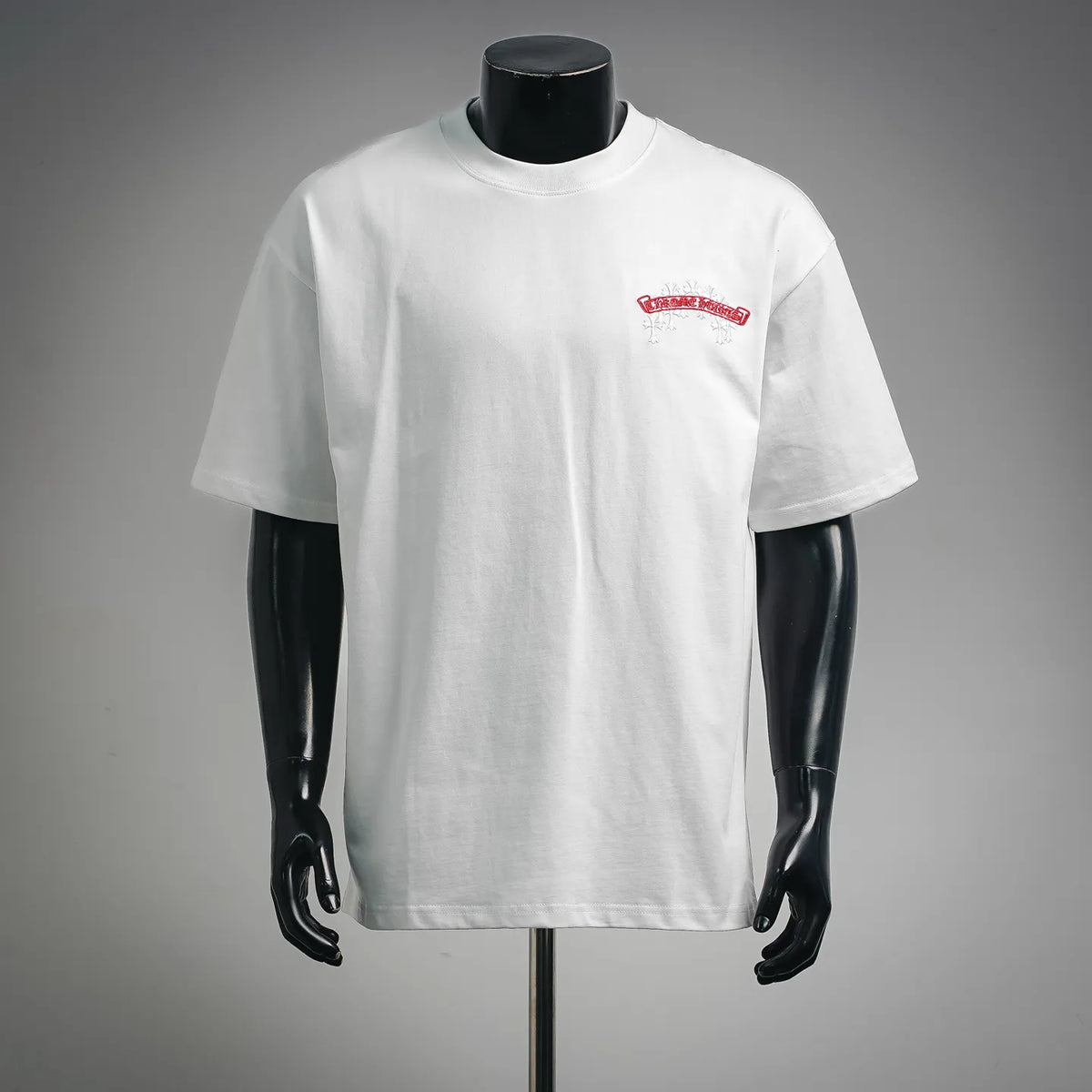White short-sleeve crewneck T-shirt with small red-and-white chest logo