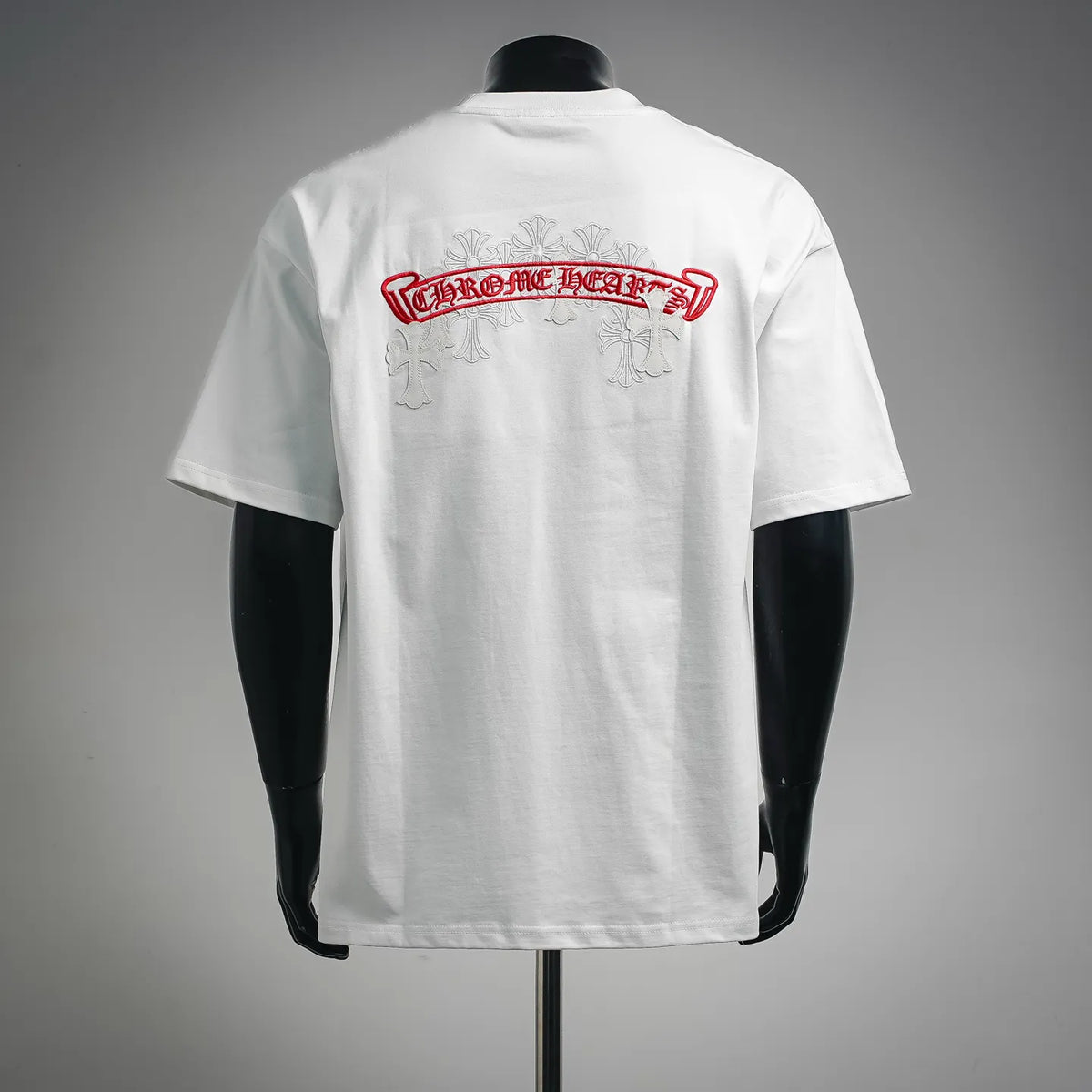 White short-sleeve crewneck T-shirt, large red logo banner on upper back