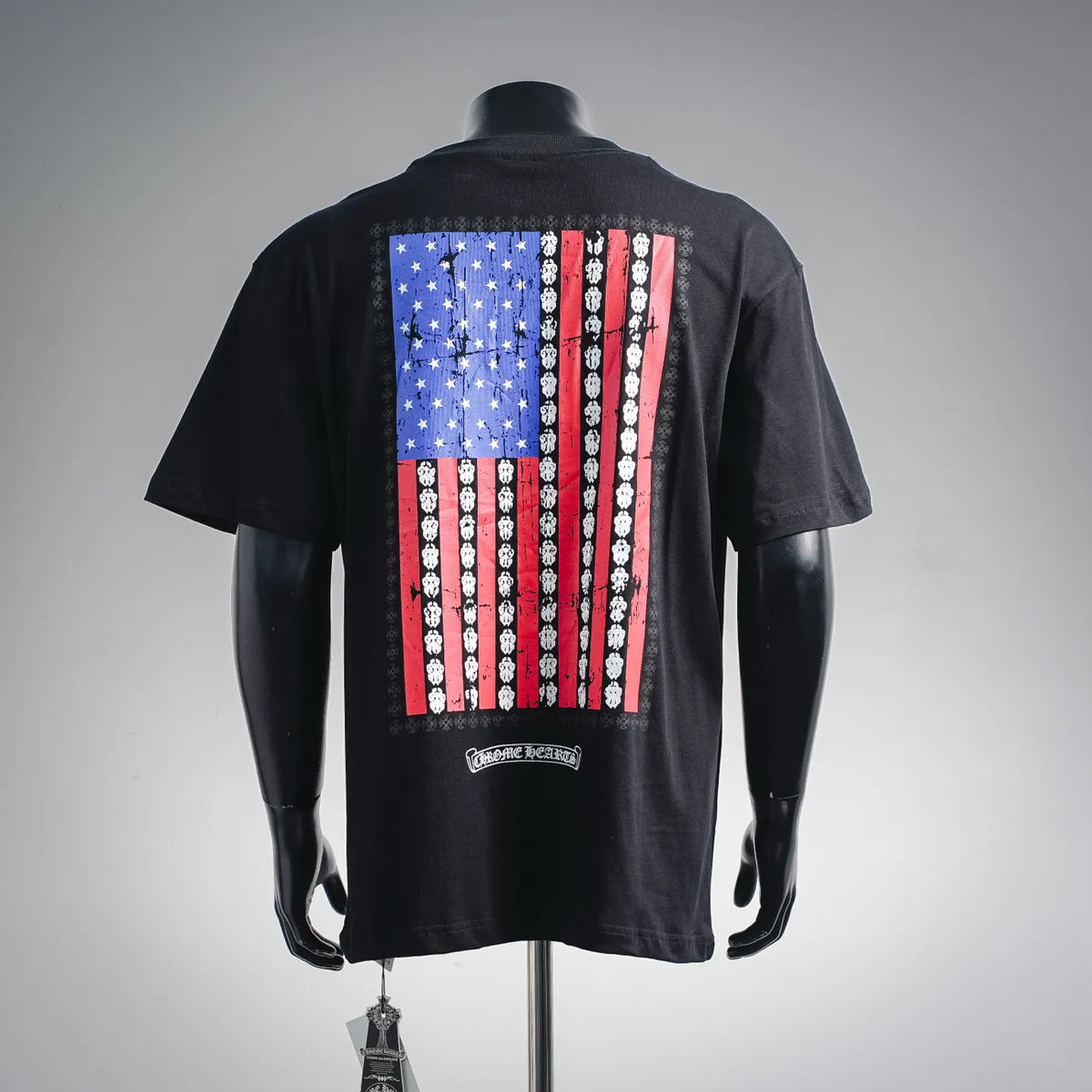 Black short-sleeve T-shirt with back American flag graphic panel and small chest logo