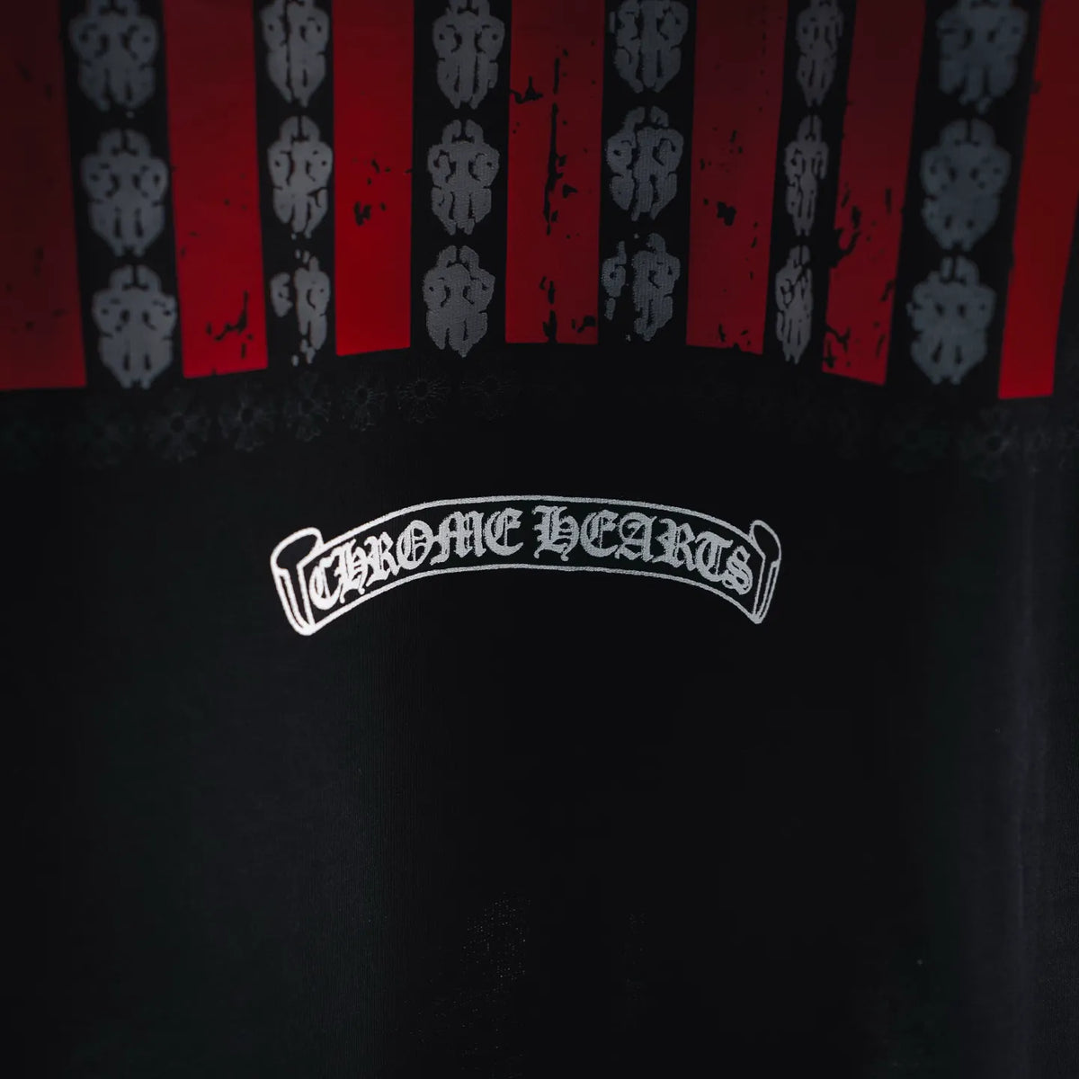 Black T-shirt with centered white Chrome Hearts logo graphic