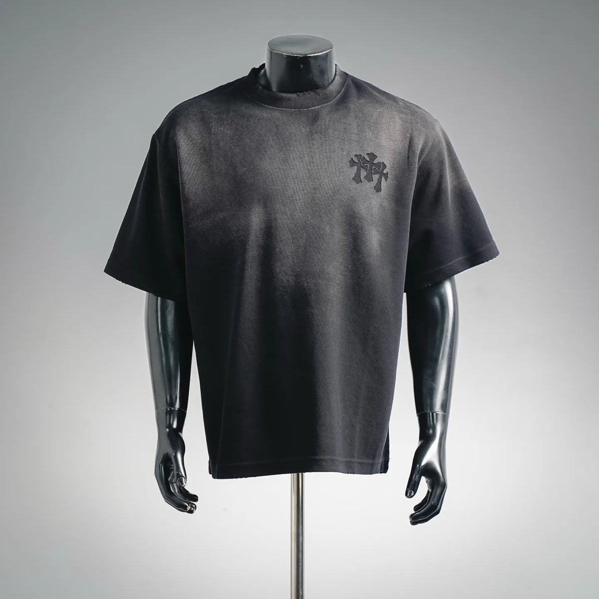Black short-sleeve T-shirt with small chest graphic logo, crew neck