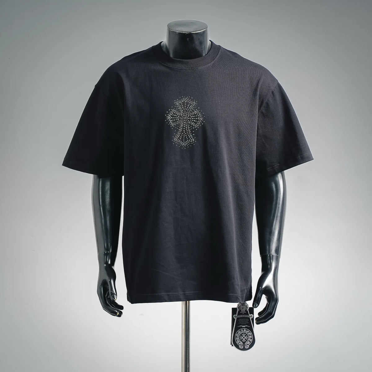 Black short-sleeve T-shirt with rhinestone starburst logo on chest