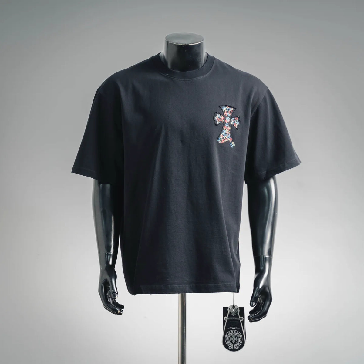 Black T-shirt with front graphic cross patch on the chest