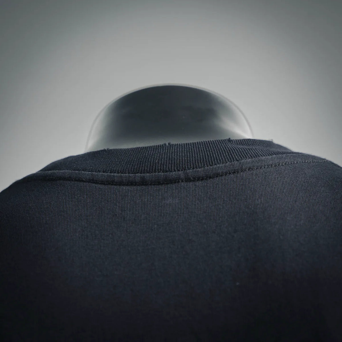 Black T-shirt collar and shoulders with ribbed crew neck