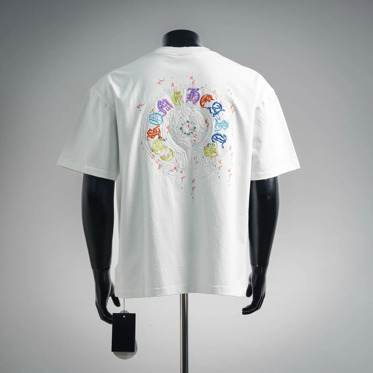 White short-sleeve T-shirt with large multicolor embroidered back graphic