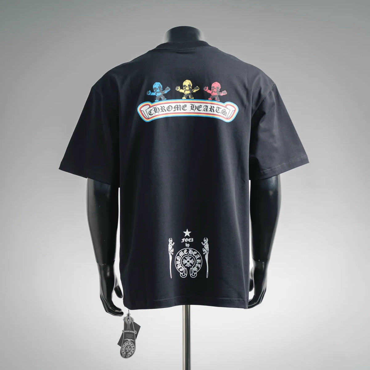 Black graphic T-shirt with back logo print and small centered emblem
