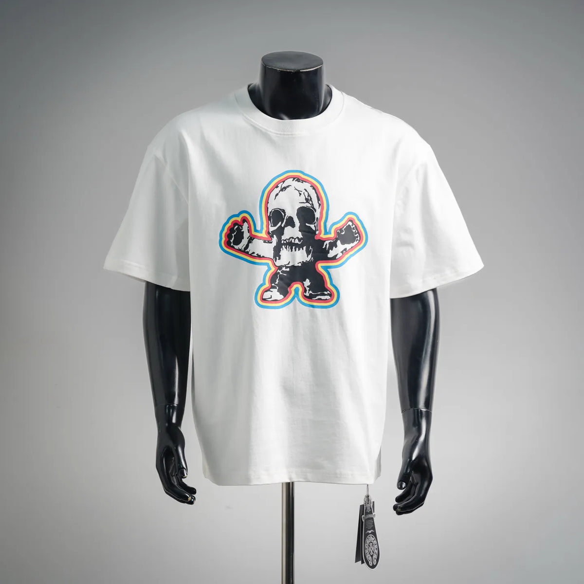 White graphic T-shirt with large skull crossbones logo on the front