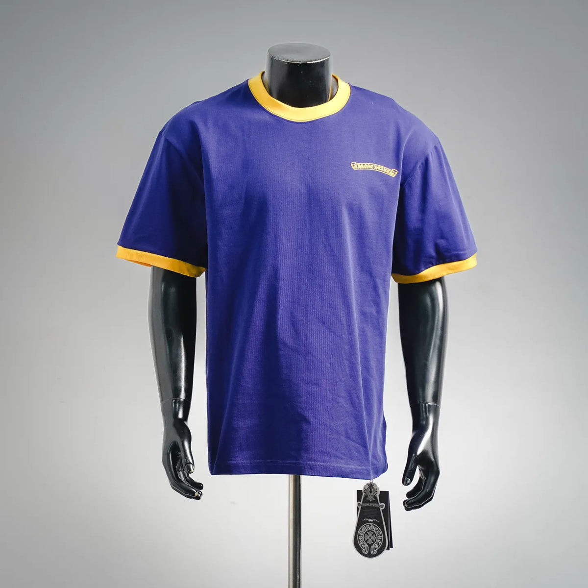 Royal blue short-sleeve T-shirt with yellow ribbed collar and sleeve cuffs.