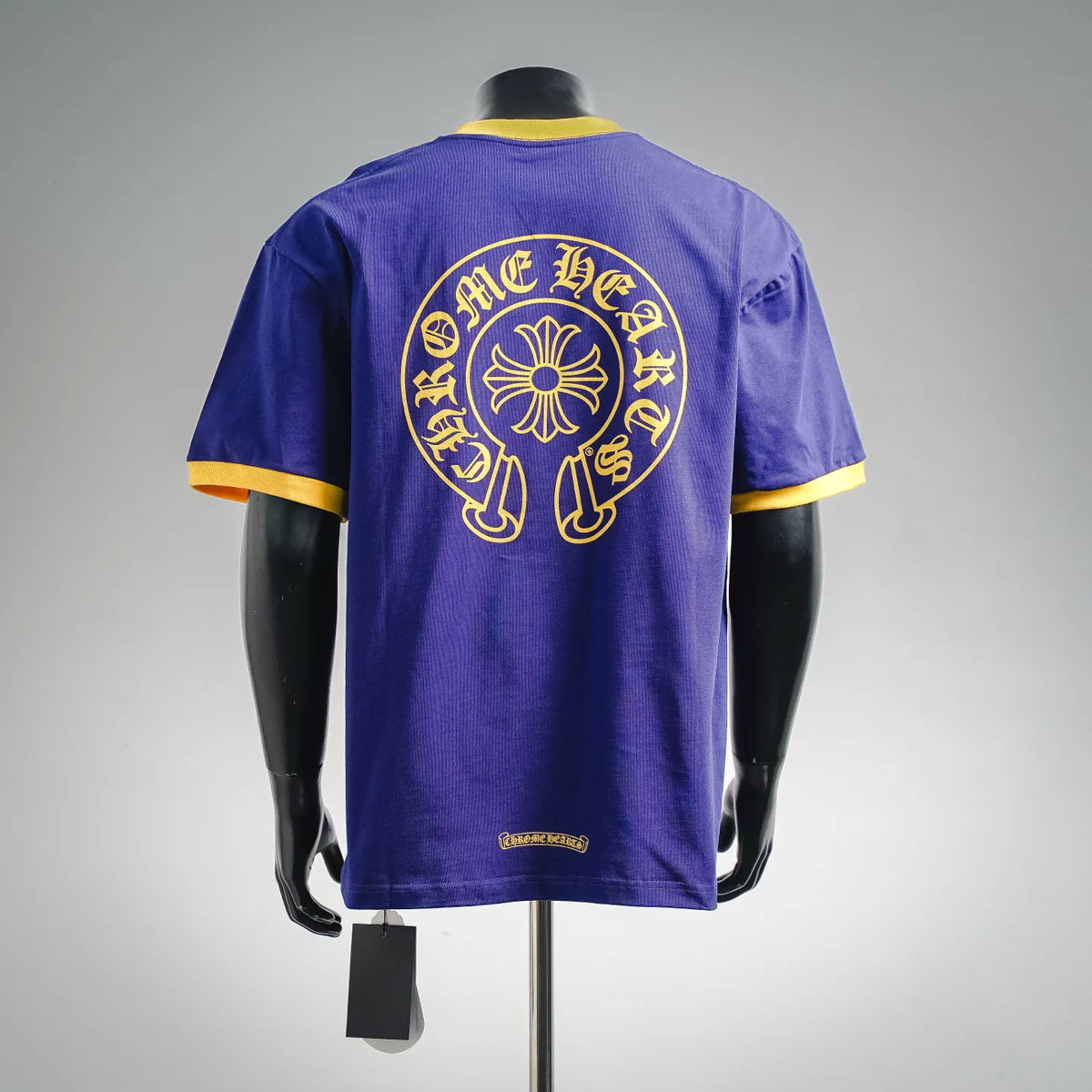 Royal blue short-sleeve T-shirt with yellow back circular logo graphic and trim.