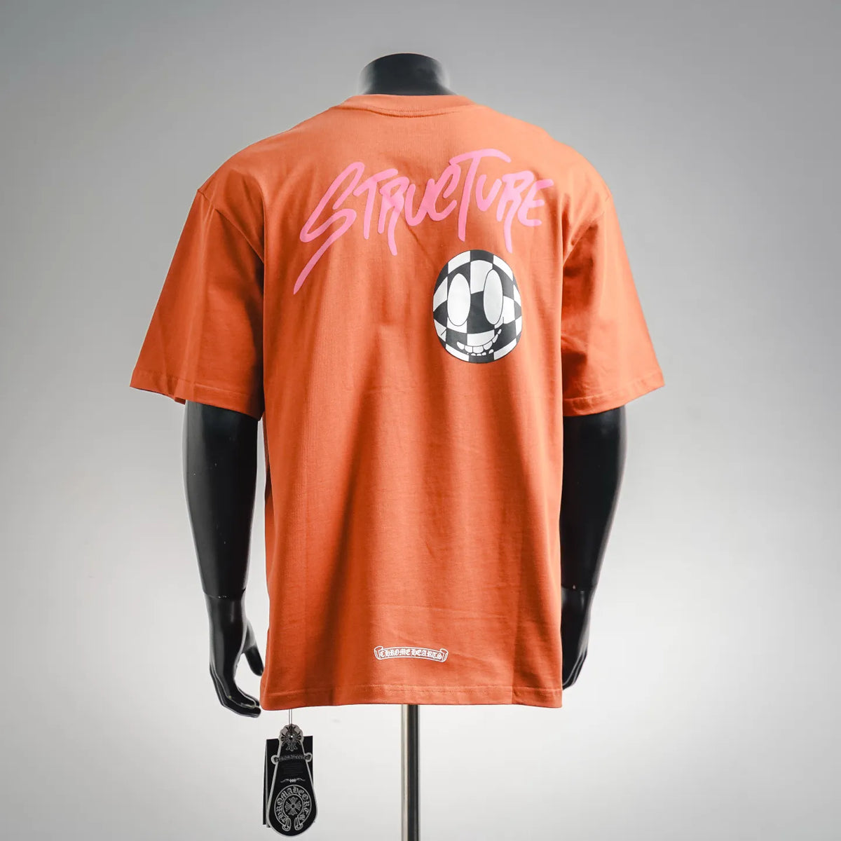 Orange short-sleeve crewneck T-shirt with large back soccer ball graphic