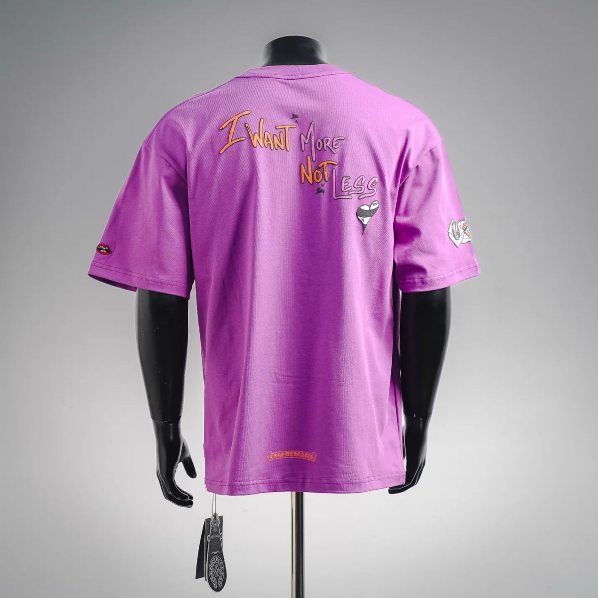 Purple short-sleeve T-shirt with back graphic text and small emblem on sleeve