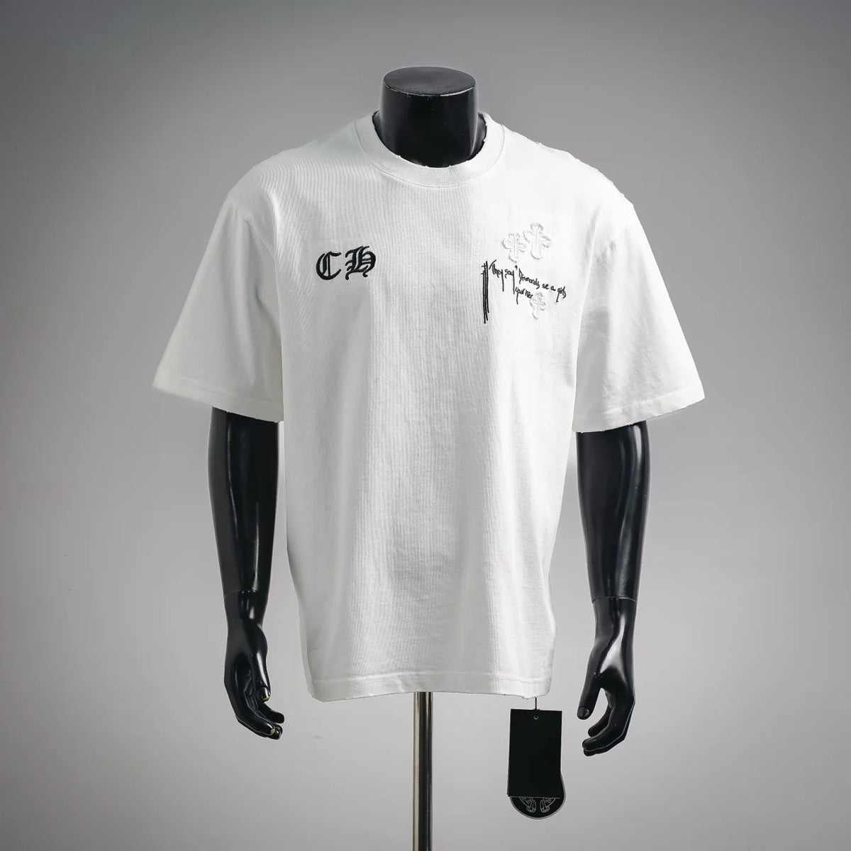 White short-sleeve crewneck T-shirt with black chest logo embroidery on mannequin