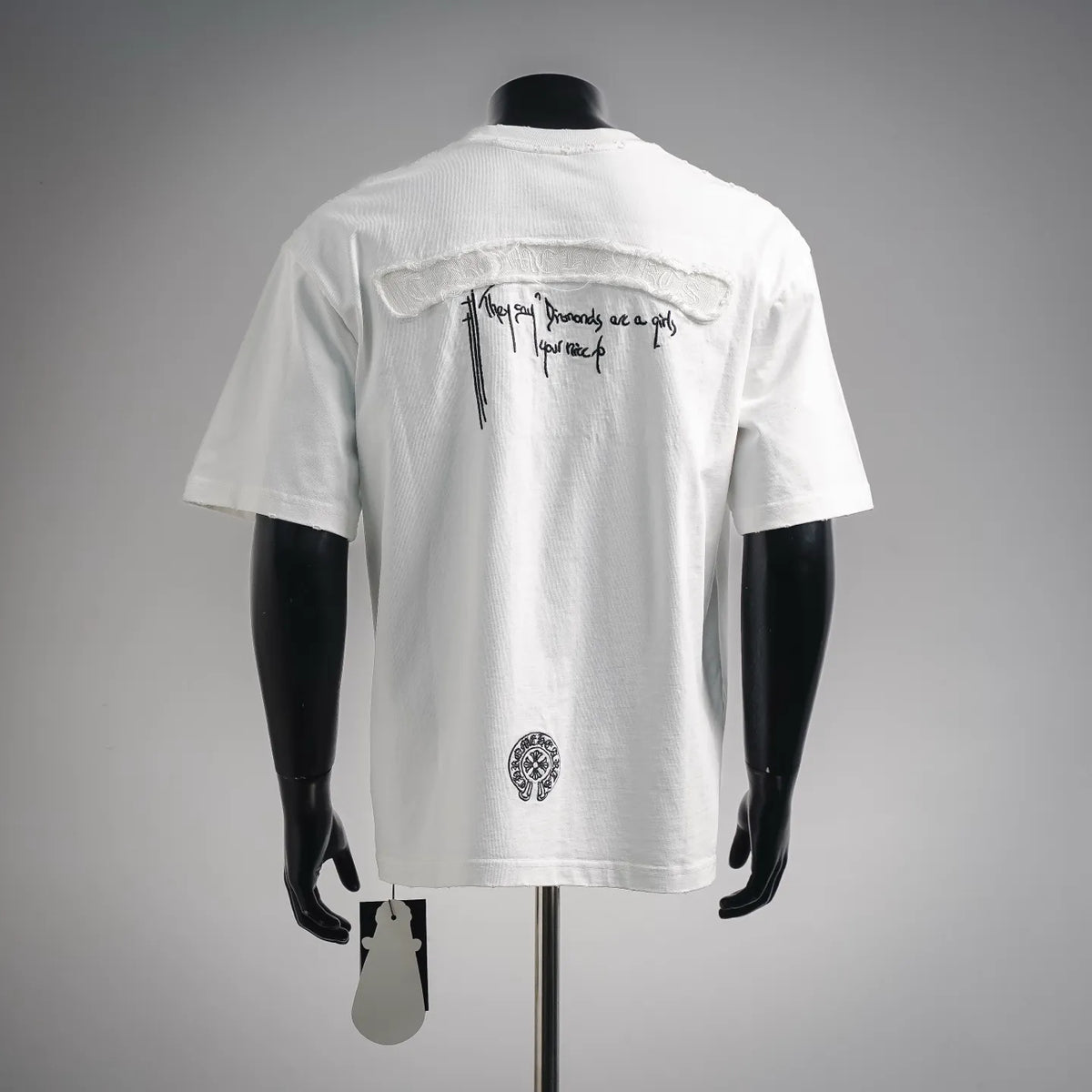 White short-sleeve crewneck T-shirt back view with black graphic print and round emblem