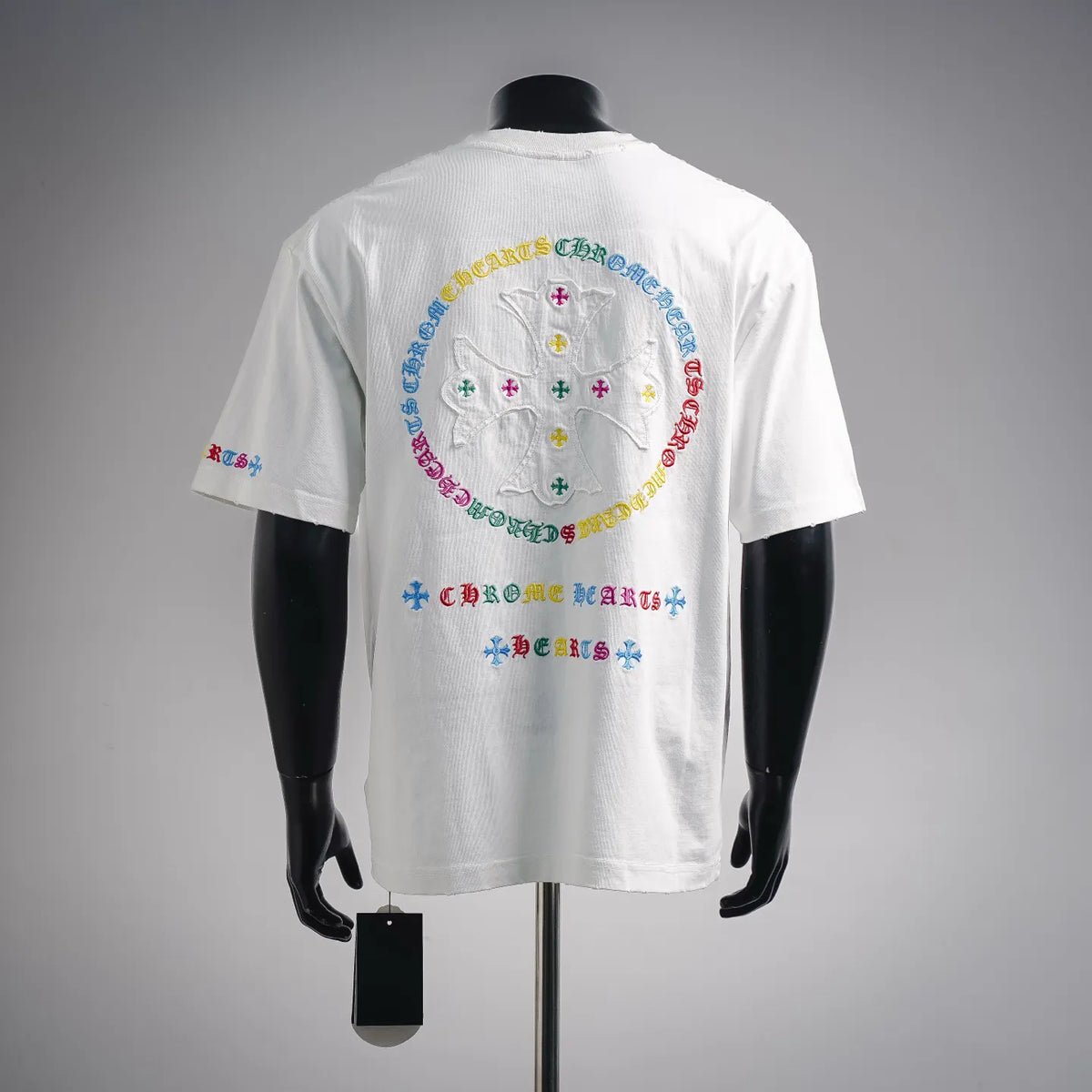 White short-sleeve graphic T-shirt with colorful circular back print