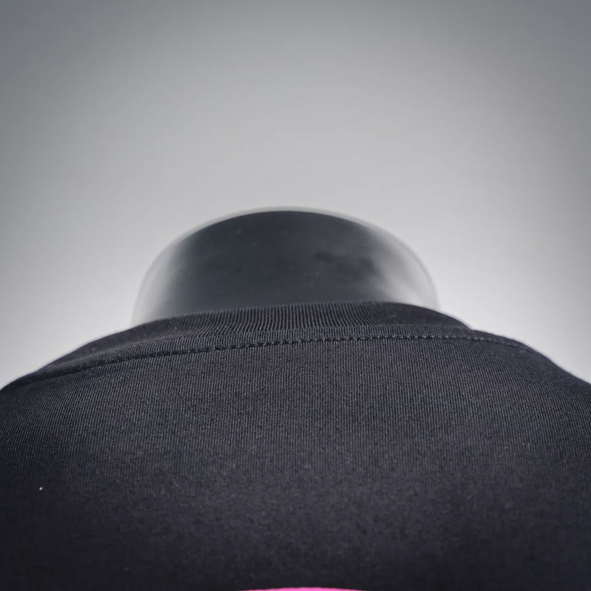 Black crew-neck collar of short-sleeve T-shirt, smooth neckline