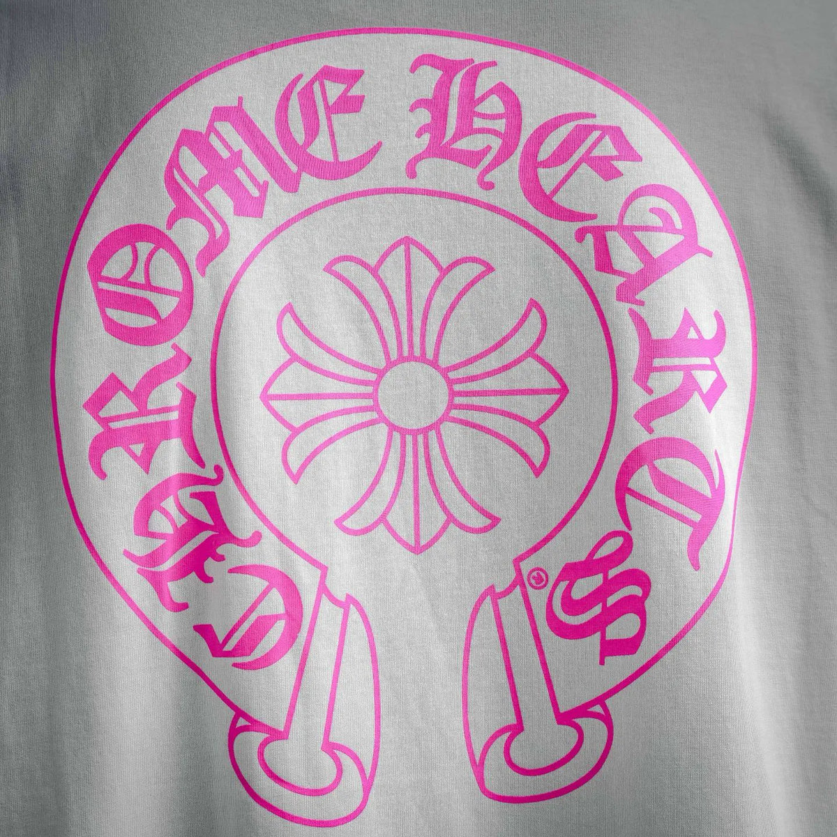 White T-shirt with large pink circular back graphic design