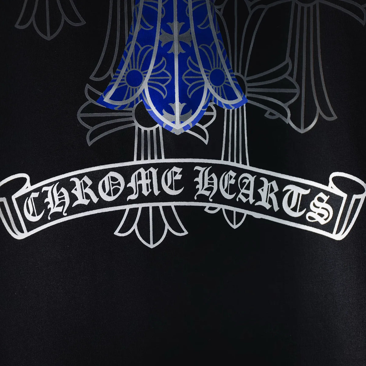Blue-and-white cross print with stylized text on black T-shirt front