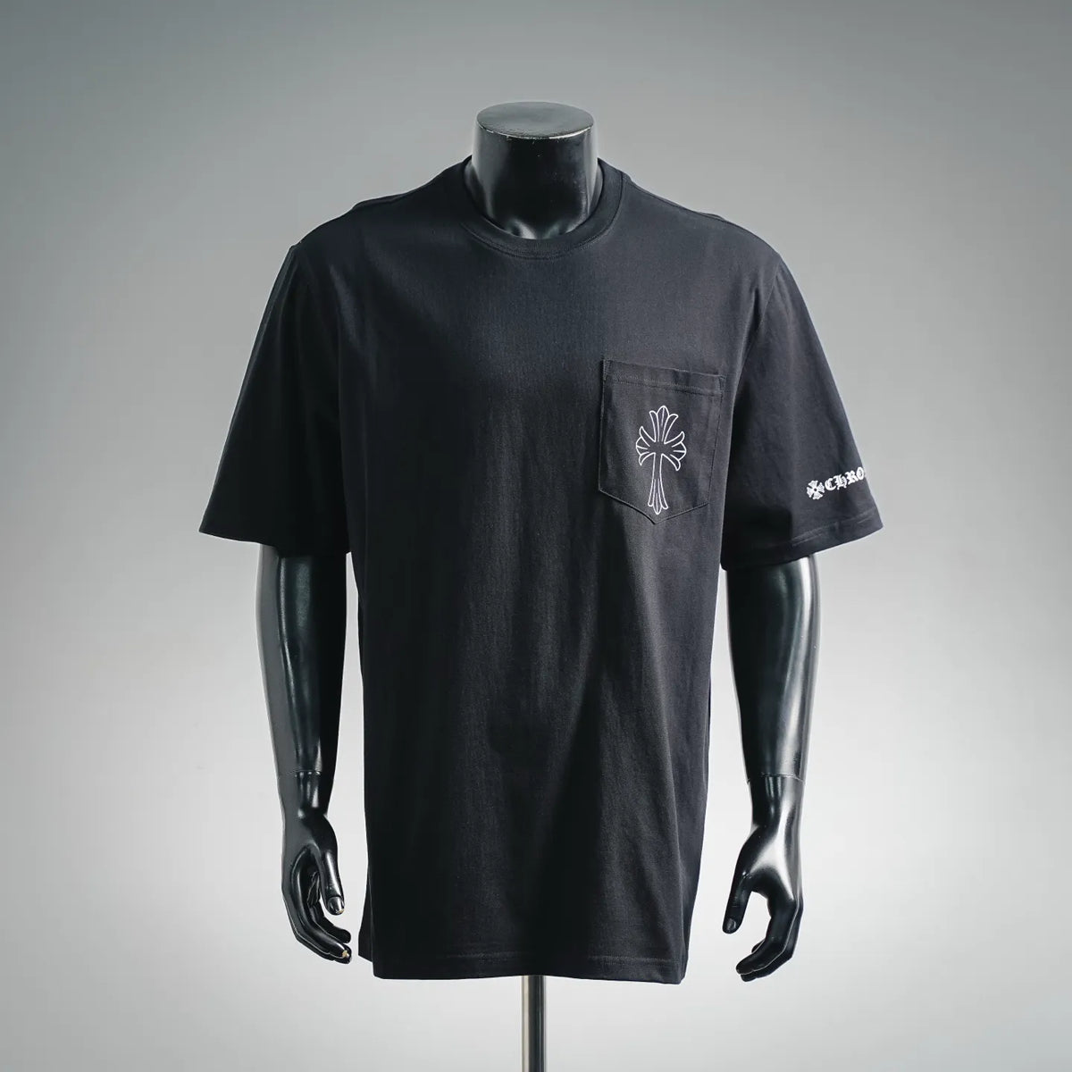 Black crewneck T-shirt with front chest logo emblem patch