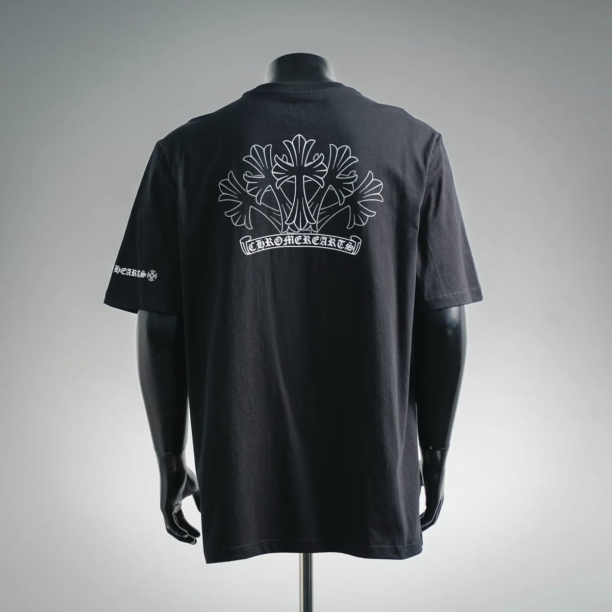Black crewneck T-shirt with large back floral cross graphic