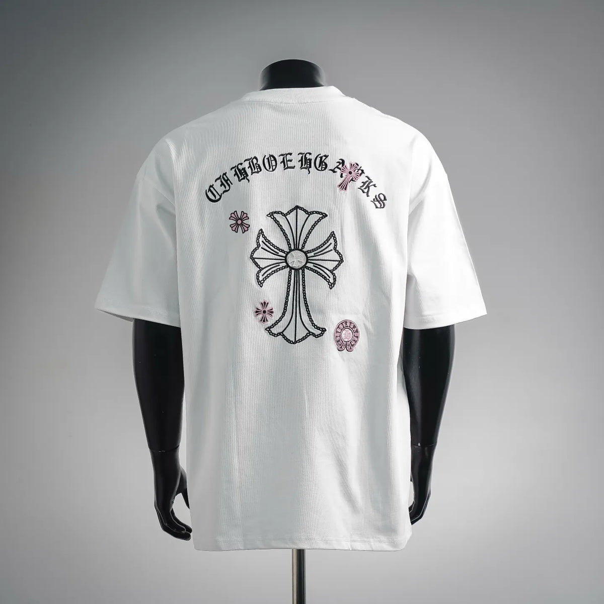 White short-sleeve T-shirt, back view with large cross-style graphic print