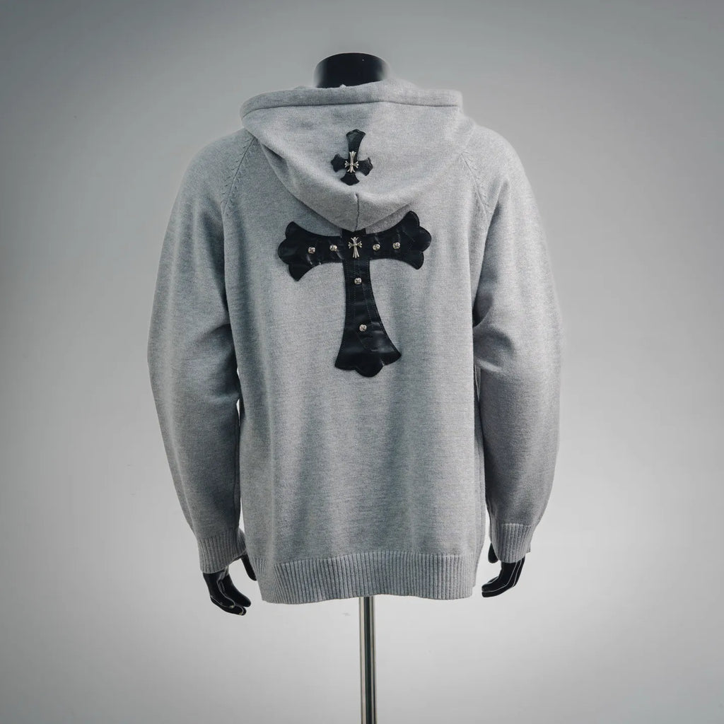 Light gray zip-up hoodie back with hood and dark cross graphic applique.