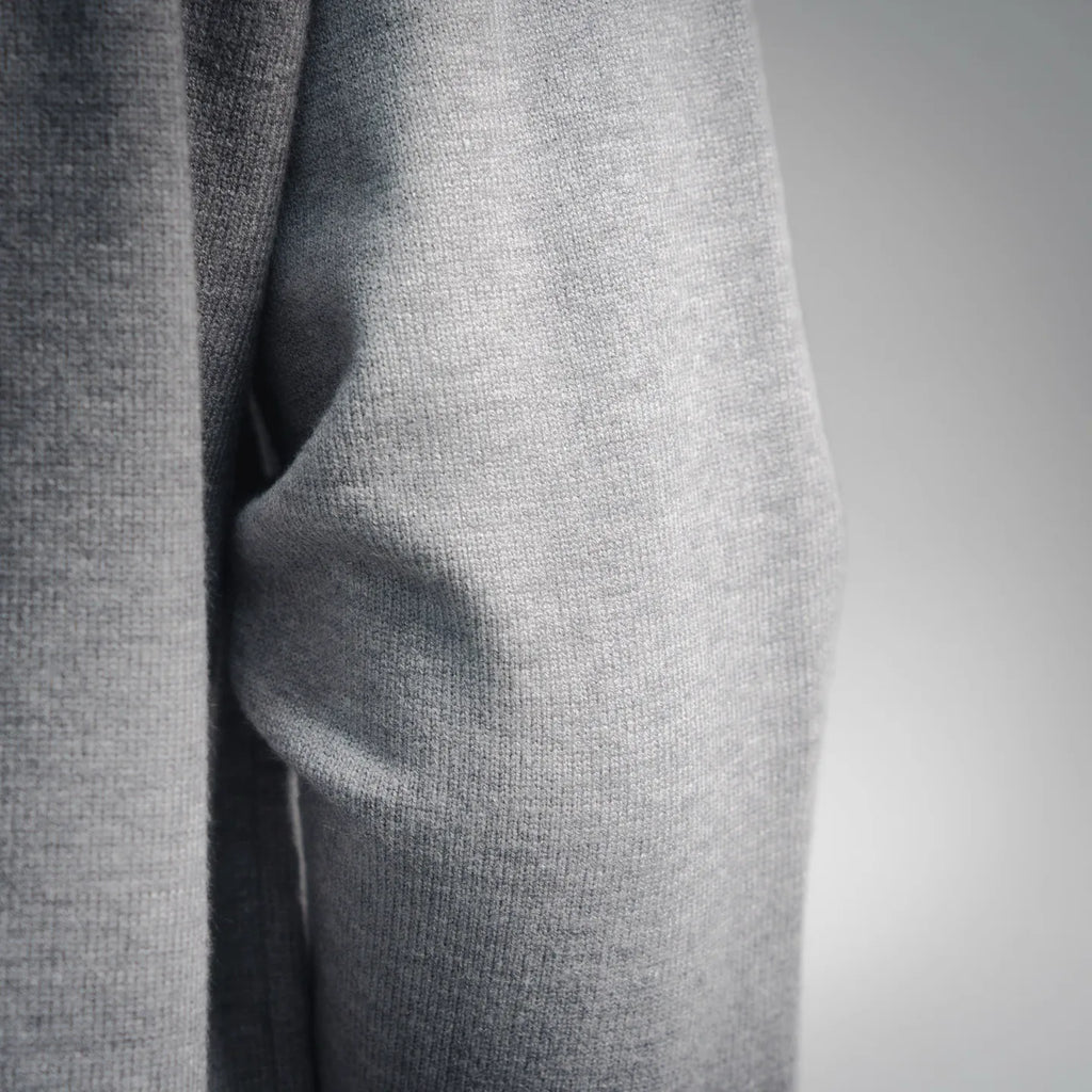 Light gray hoodie knit fabric close-up.