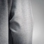 Light gray hoodie knit fabric close-up.