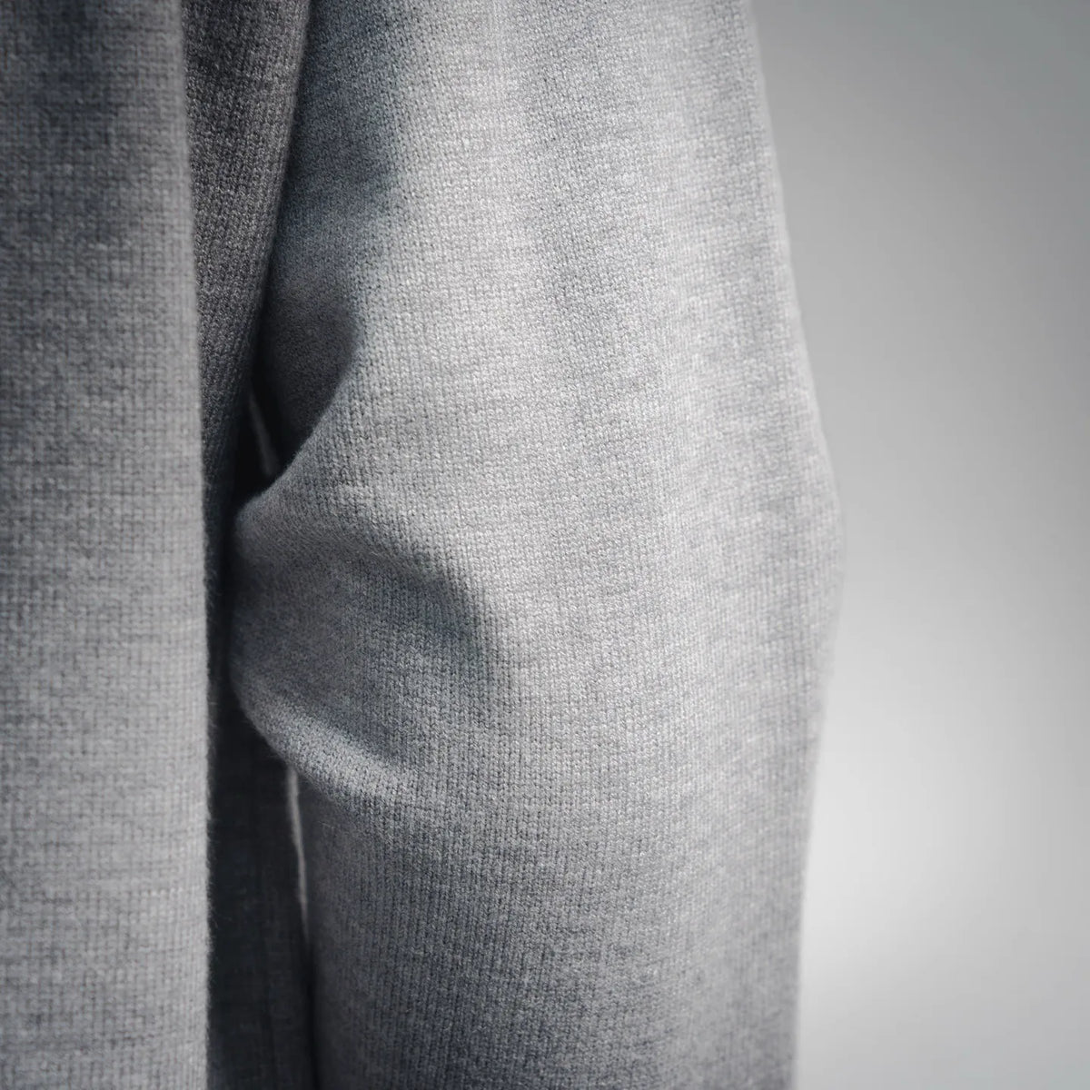 Light gray hoodie knit fabric close-up.
