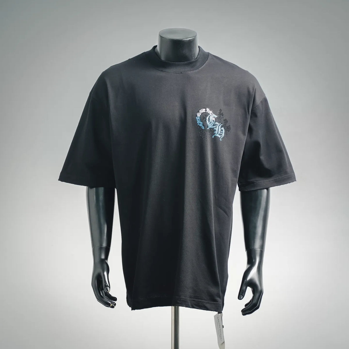 Black crew-neck T-shirt with small chest rhinestone graphic in silver and blue