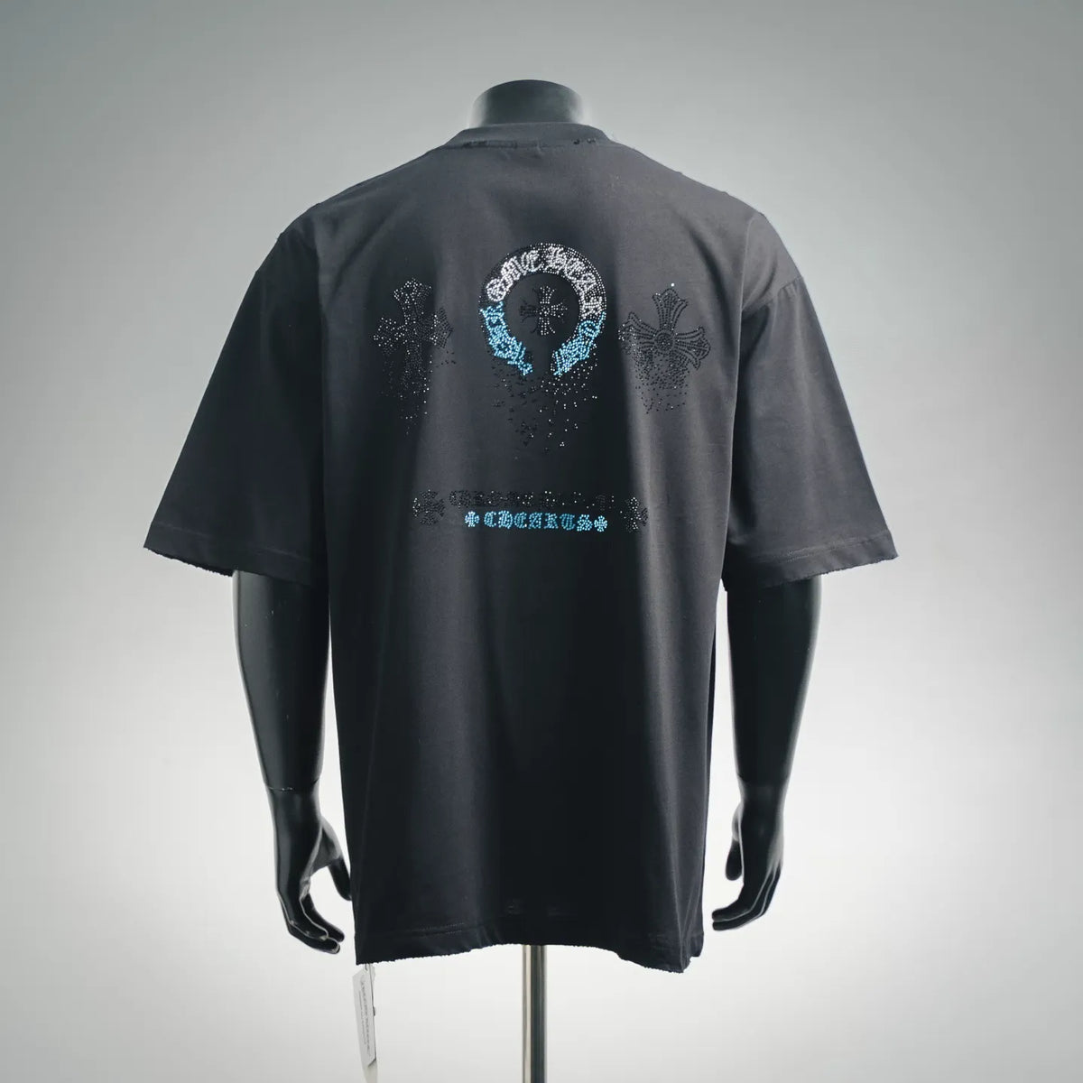 Black crew-neck T-shirt with large back rhinestone emblem and star details