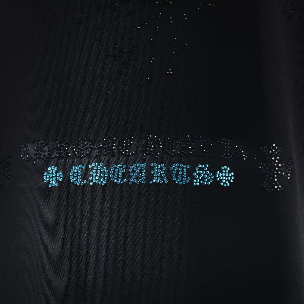 Black T-shirt front with blue and silver rhinestone lettering graphic