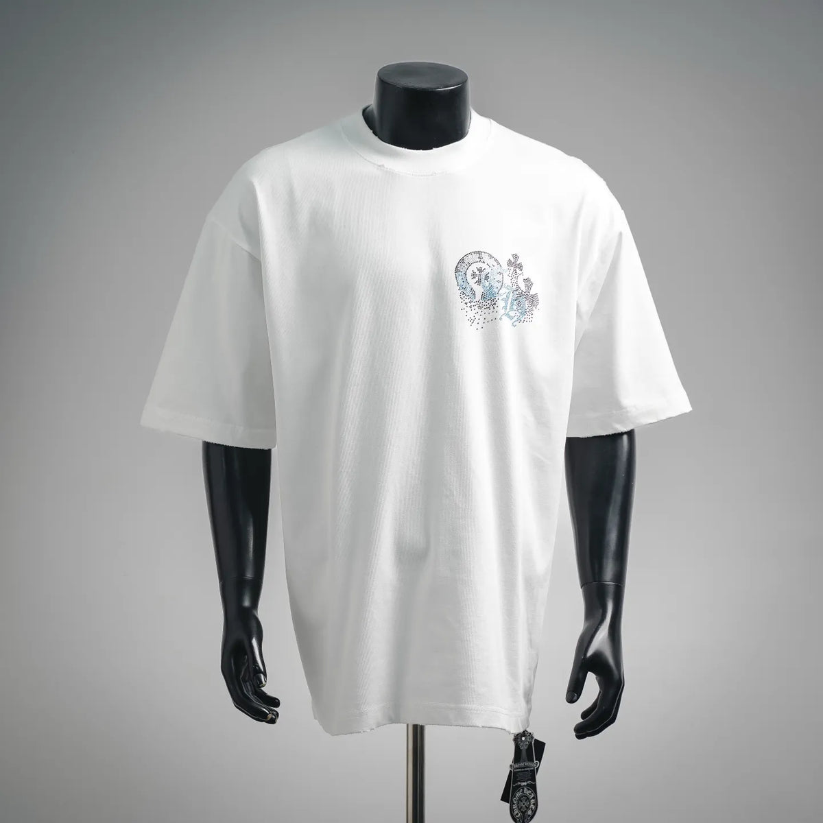 White crew-neck T-shirt with rhinestone chest graphic and snowflake accents