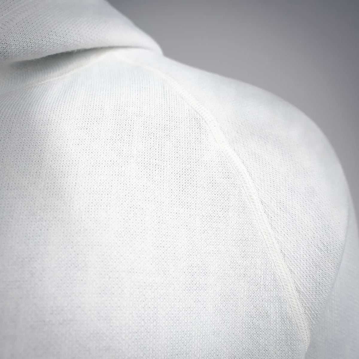 White knit hood panel with smooth fabric texture