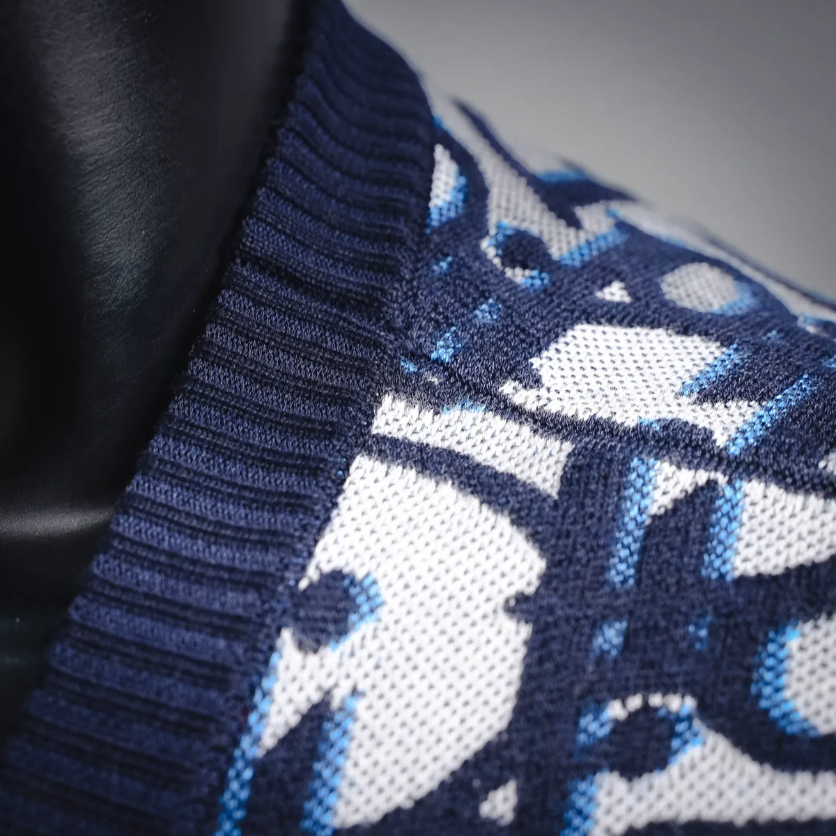 Dior knit sweater sleeve cuff, ribbed dark-blue knit and logo jacquard