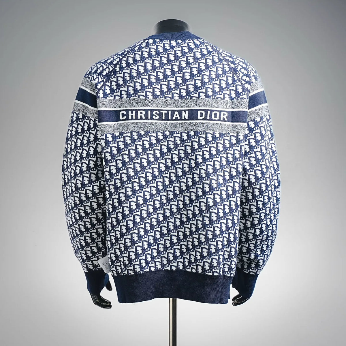 Back view Christian Dior long-sleeve sweater with blue and white monogram print stripe