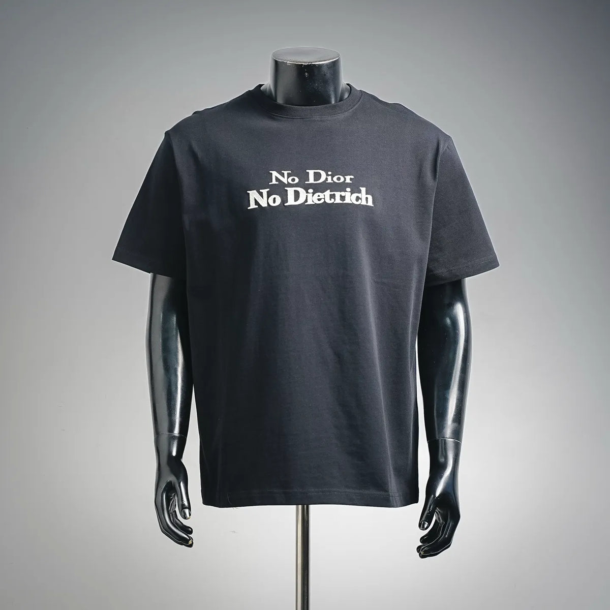 Black crewneck T-shirt with “No Dior No Dietrich” graphic front