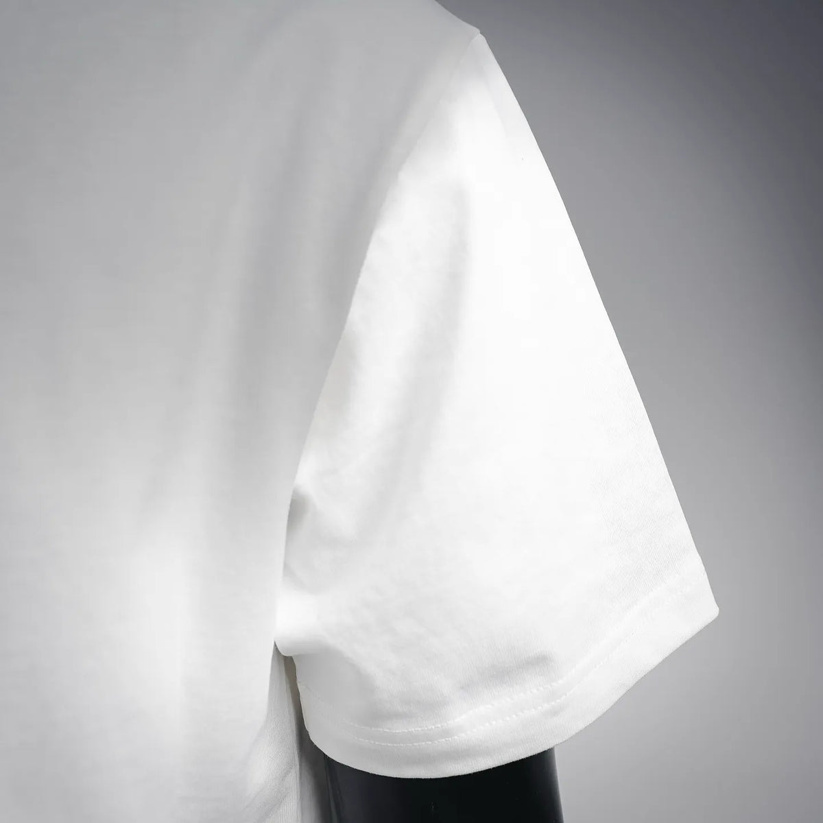 White Dior short-sleeve T-shirt with side drape and hem