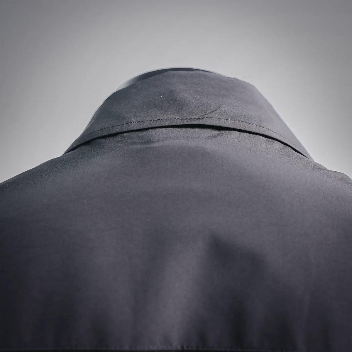Dior dark coat hoodless back collar detail with stitched seam