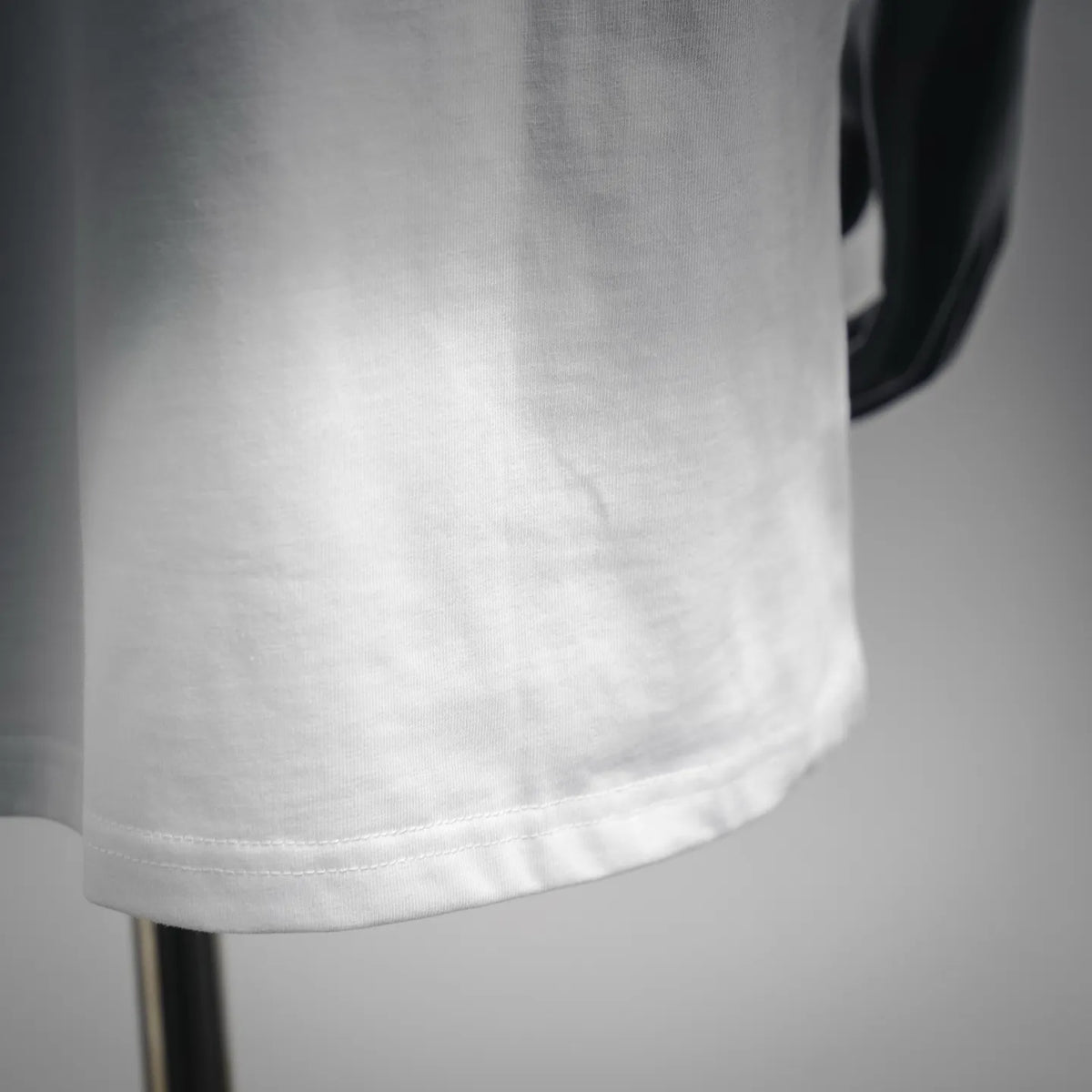 White Dior T-shirt hem and stitching detail