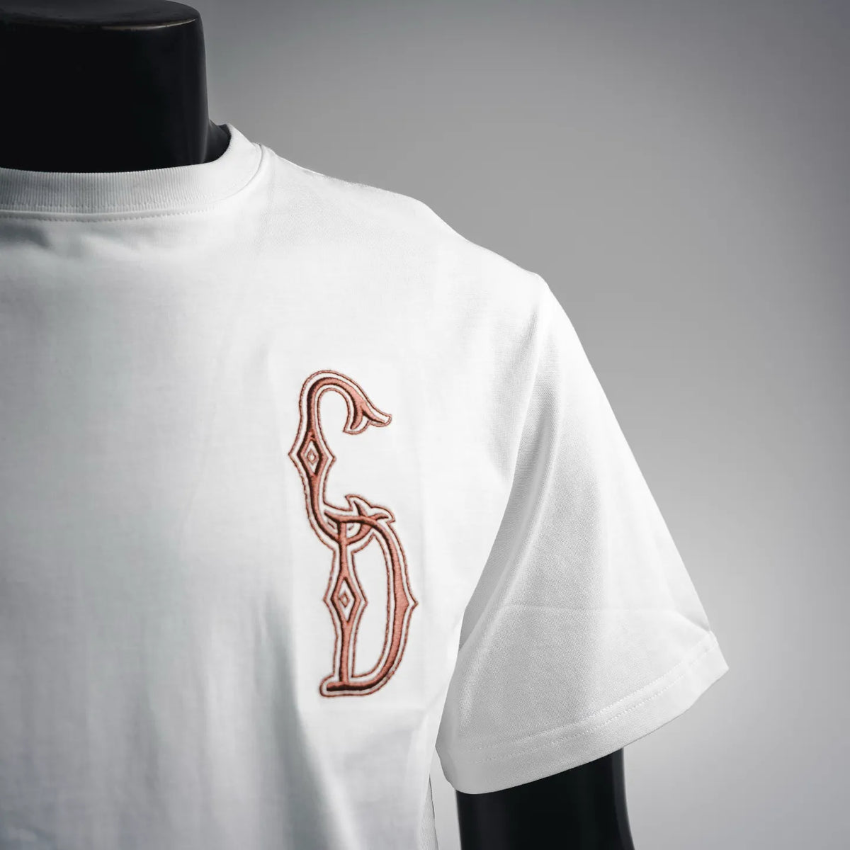 White crewneck T-shirt with brown Dior monogram on left chest